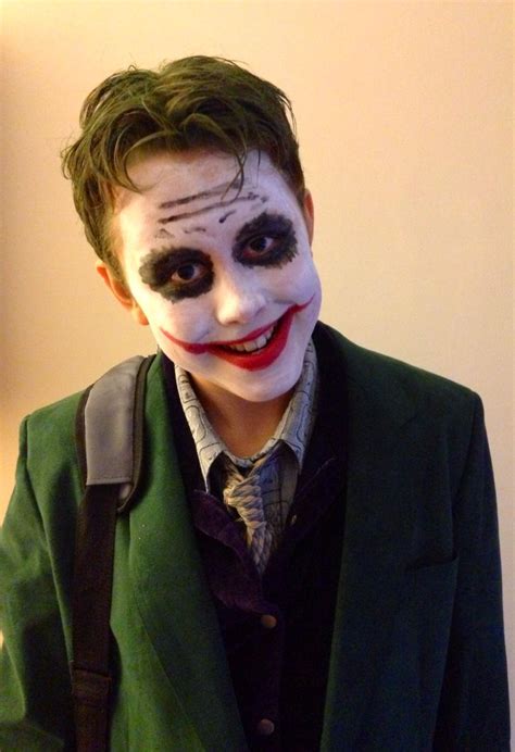 Adds sparkle to your party look. DIY Joker costume: face paint, green hair spray paint, & a ...