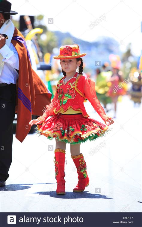 Plenty of women's clothing to choose from. A young girl in traditional bolivian costume during ...