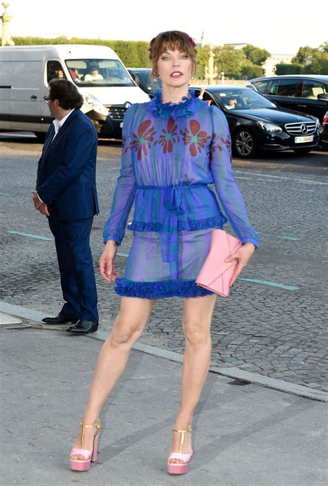 Milla Jovovich Arrives At Mui Mui Fashion Show At Paris Fashion Week