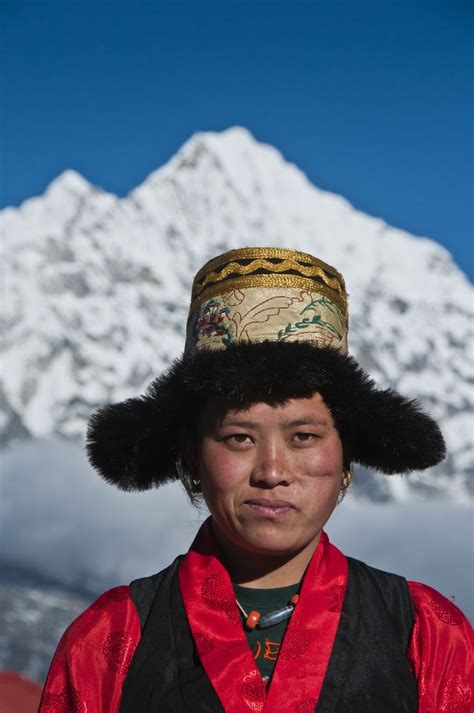 Folks In Traditional Sherpa Clothing From The Northern Region Of Nepal