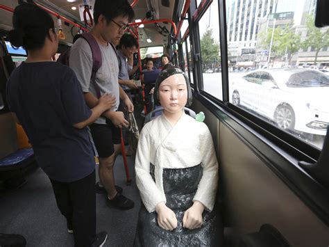 Comfort Woman Memorial Statues A Thorn In Japan S Side Now Sit On Korean Buses Parallels Npr