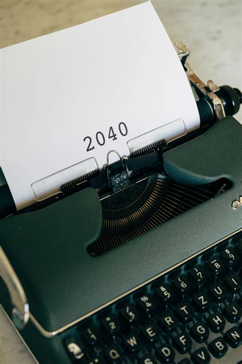 An Old Typewriter With 2040 Typed On Paper · Free Stock Photo