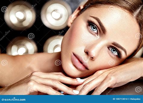 Portrait Of Beautiful Woman Model With Makeup And Clean Healthy Skin