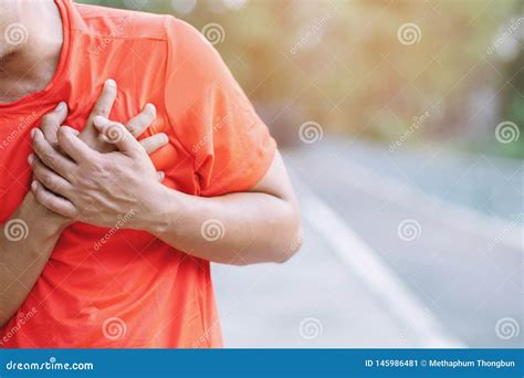Jogging Running Athlete Man Having Chest Pain While Exercising Stock