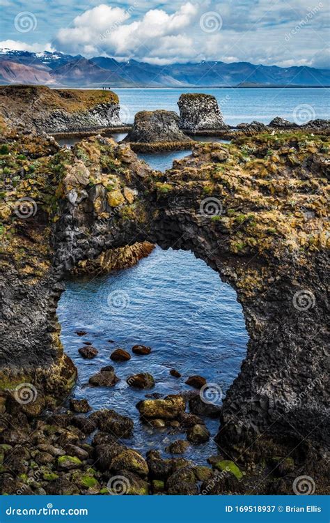 Iceland Circular Rock Formation In The Sea Londrangar Stock Image