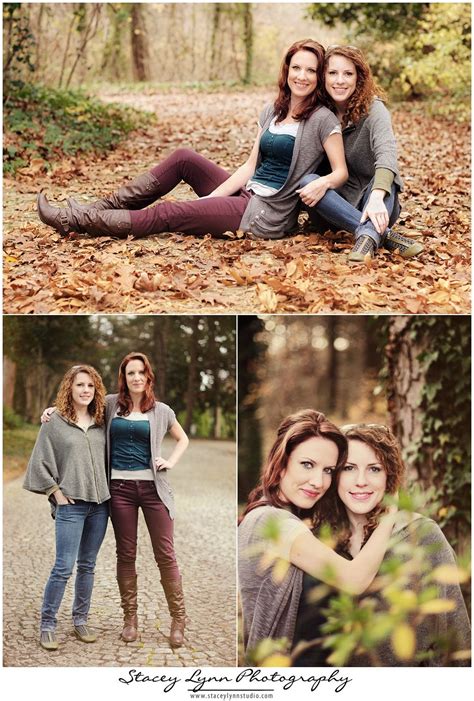 Two Women Are Sitting On The Ground And One Is Posing For A Photo With Her Friend
