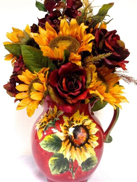 This autumn harvest wreath features gold painted pumpkins that are accented with beads, orange and yellow fall leaves, pine cones, berries, red sunflowers and glitter drenched branches grapevine base. Tuscan Silk Sunflower Floral Arrangement Burgundy Red ...