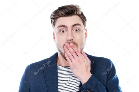 Surprised Young Man Covering Mouth — Stock Photo © Gstockstudio 65737429