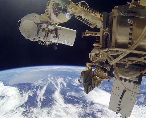 Cosmonauts Repeat Spacewalk To Add Earth Viewing Cameras To Space