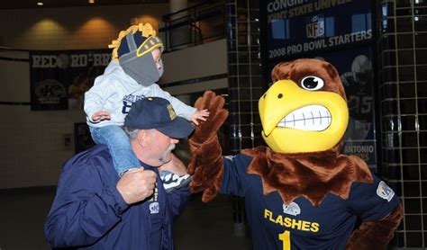 Flash Shares A High Five With A Small At Dix Stadium Nov 29 2012