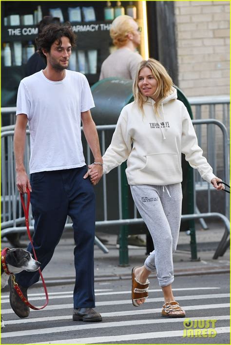 Sienna Miller And Boyfriend Oli Green Hold Hands While Picking Up