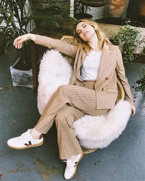 lily via her ig sleeping in her fave sezane and treja trainers gosh this whole outfit so