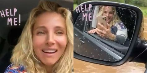 elsa pataky escapes through car window after getting stuck in flood video elsa pataky just