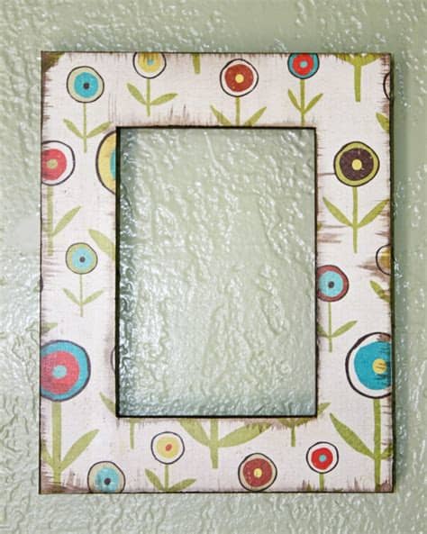 If the idea of cutting up comic books doesn't work for you, use color copies (preferably laserjet) for the task. Using Paper to Decorate a Frame - Stacy Risenmay