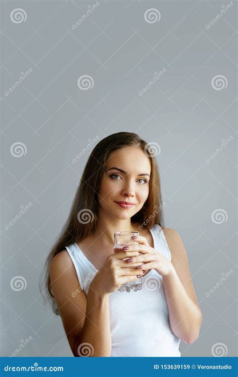 Healthy Lifestyleyoung Woman Drinking From A Glass Of Fresh Water