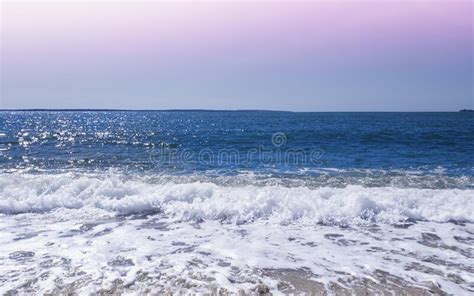 Sunset Seascape With White Waves And Soft Pink Clouds Over Martha`s