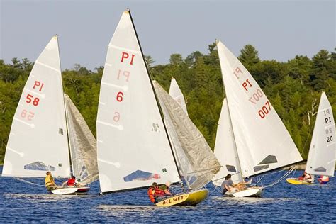 Scow — a scow, in the original sense, is a flat bottomed boat with a blunt bow, often used to haul garbage or similar bulk freight; International sailing races return to Bobcaygeon | Sailing, Yacht, Yacht club