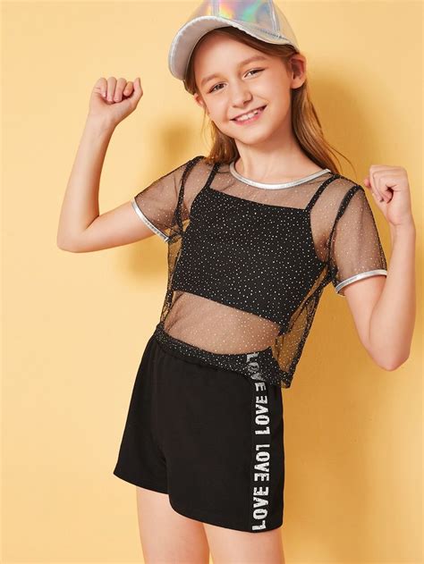 conjunto de niñas top con malla unido de color metálico en contraste con shorts … moda