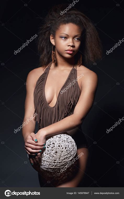 A mulatto is defined as: Young mulatto with a sports figure — Stock Photo © KarchevskayaZhanna #145978947