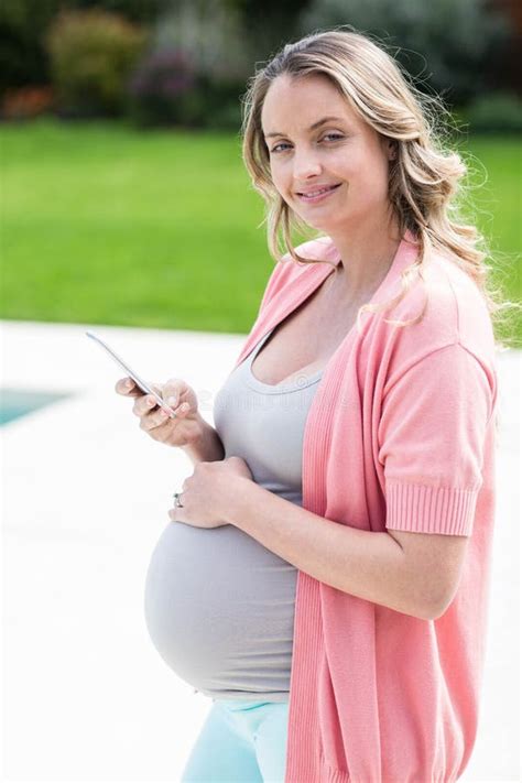 Pregnant Woman Standing Pool Touching Her Belly Stock Photos Free