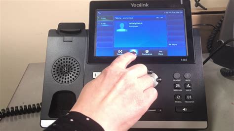 Placing a Call on Hold on a Yealink T48 - YouTube