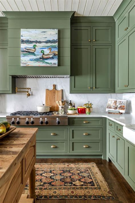 Traditional Farmhouse Kitchen With Green Cabinets And Artwork Home