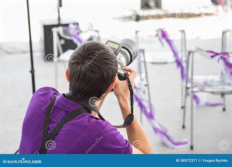 Wedding Photographer In Action Stock Image Image Of Equipment