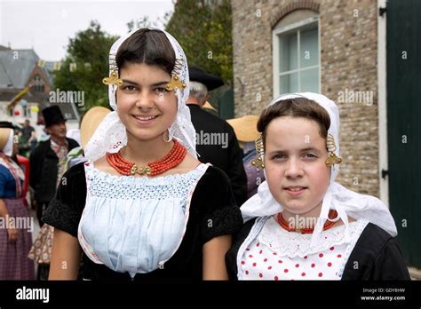 two dutch girls from the province of zeeland wearing typical nostalgic costumes of the