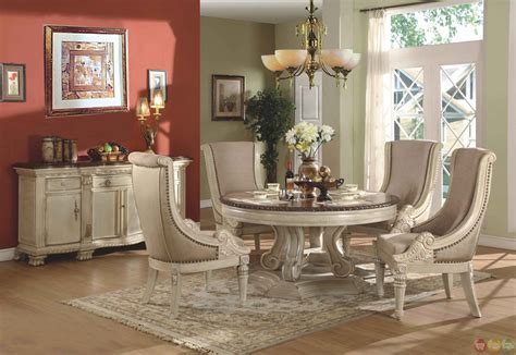 Pick out a spacious dining table with room for six and envision all the dinner parties and holiday meals you can host throughout the years, or go for a more informal approach and design a cozy nook for meals. Halyn Antique White Round Formal Dining Room Set