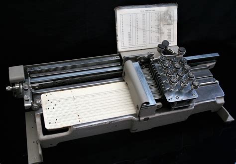 Time recorder machine of human errors,saved time and money. ICL Hand Punch Card Machine from 1969 - historictech