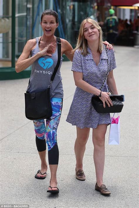 Janice Dickinson Parades Slender Figure In Bright Leggings While Out To