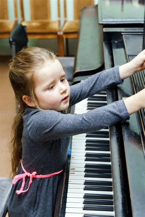 Cute Little Girl Playing Grand Piano Stock Photo Image Of Plays