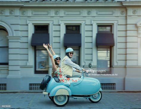 Couple Driving Vintage Scooter And Sidecar High Res Stock Photo Getty