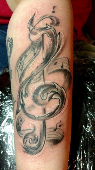 25 inspiring tattoos all music lovers will appreciate. Music tattoo g clef tattoos treble clef | Tattoos, Music tattoo, Tattoo designs