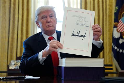 trump signs sweeping tax bill into law anchorage daily news
