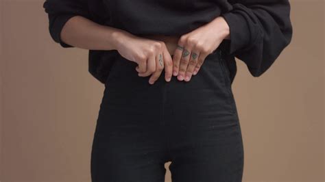 closeup of woman s waist hand touching pants stock footage sbv 321844247 storyblocks