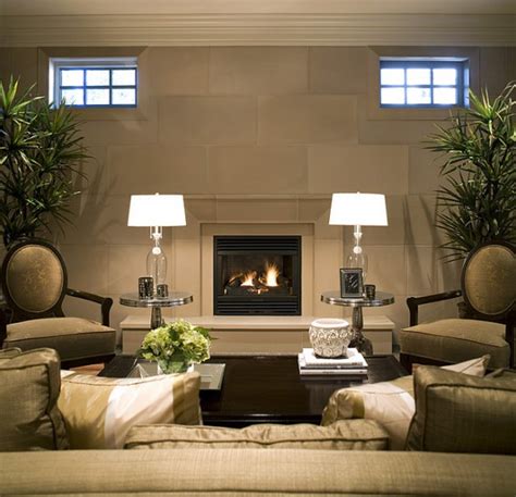 The fireplace and art are the main focus of the room without the distraction of tv. Fireplace Mantels and Surrounds