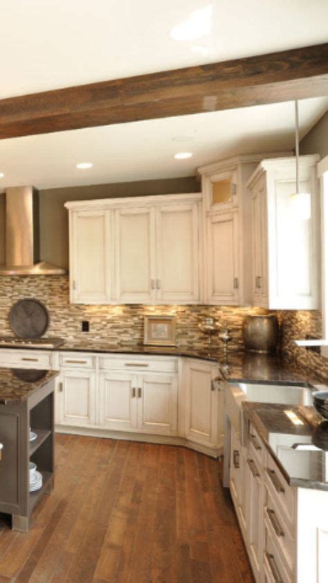 After all, beautiful dark espresso kitchen island granite and white cabinets rest of the kitchen decorated with arctic cream granite countertop. Our kitchen would look similar with the painted cream cabinets,dark floor, same colors for ...
