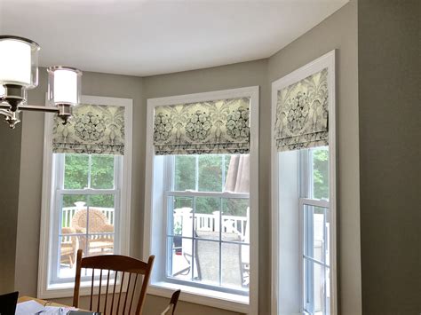 Bay Window With Roman Shades And Curtains Windowcurtain