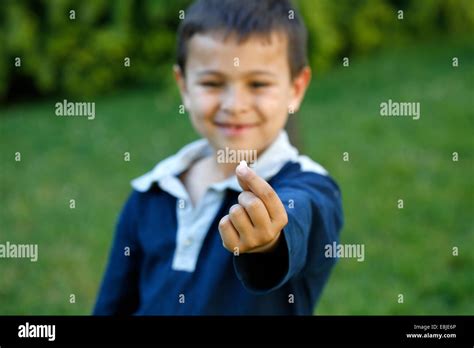 7 Year Old Boy Showing A Missing Tooth Stock Photo Alamy