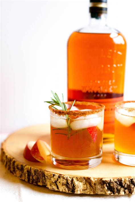 Cinnamon Bourbon Apple Cider With Rosemary Cocktail Recipe Charmingly Styled Bourbon Apple