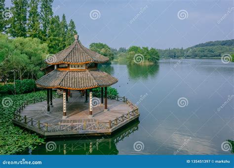 Traditional Chinese Pavilion Over Water At West Lake Hangzhou China