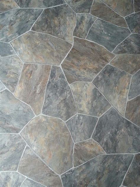 A Stone Floor Is Shown In Grey And Brown Tones