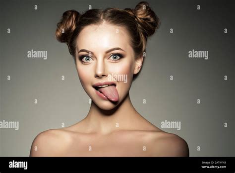Emotional Girl Beautiful Modern Model Shows Tongue Positive Woman Hipster Emotions On Face