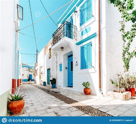 Typical Greek House With White Walls And Blue Doors Shutters And