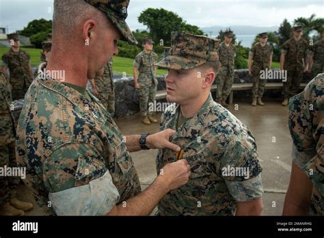 U.S. Marine Corps Col. Matthew Tracy, left, commanding officer of 4th