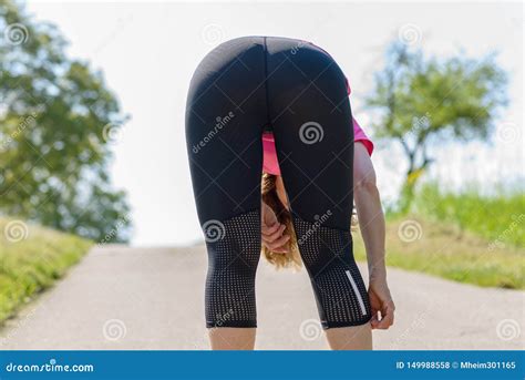 Athletic Fit Woman Bending Over Viewed From Rear Stock Photo Image Of