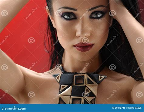 Studio Shots Of An Attractive Young Dark Haired Woman Stock Image