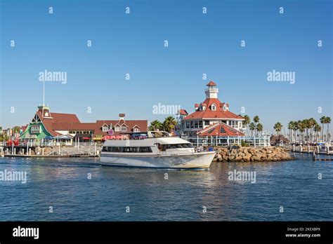 California Long Beach Harbor Cruise Boat Shoreline Village Stock