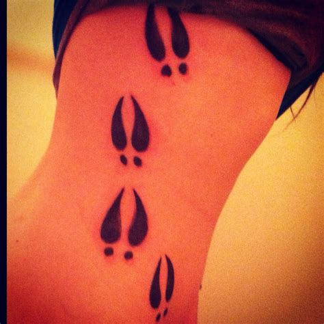 Deer Tracks On Side Of Stomach Tattoos Arm Tattoo Paw Print Tattoo